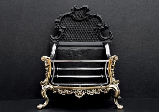A brass and steel Rococo firegrate