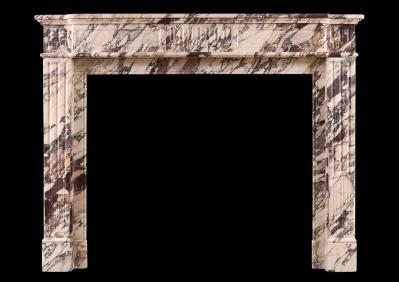 An antique marble fireplace at Olympia