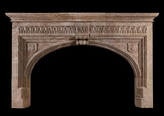 A large Gothic Ham stone antique fireplace
