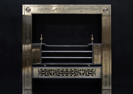 An engraved Irish Georgian style register grate