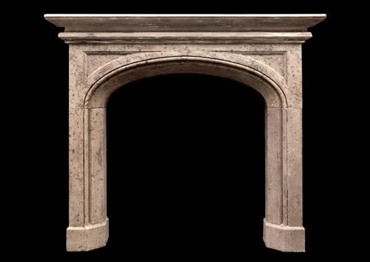 A 19th century English Gothic style stone fireplace