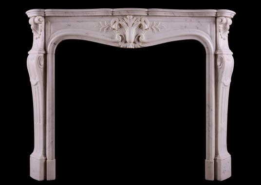 A Statuary marble fireplace in the Louis XV manner