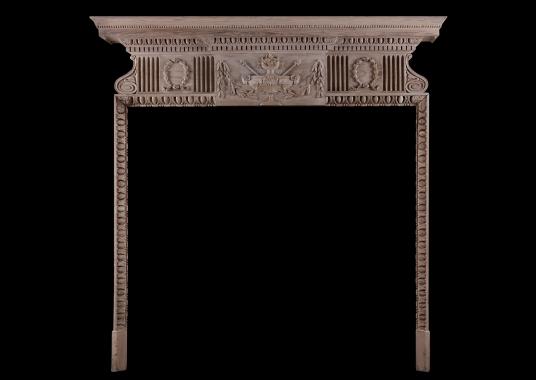 An English pine fireplace in the Georgian manner