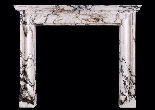 An English moulded bolection fireplace in Calacatta Verde marble