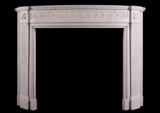 A Statuary marble bowed Louis XVI fireplace