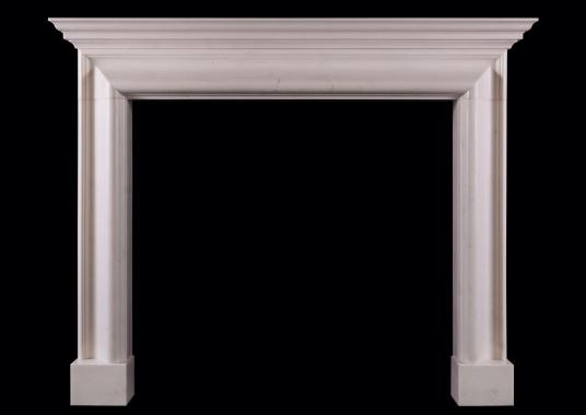 An English bolection fireplace with moulded shelf above