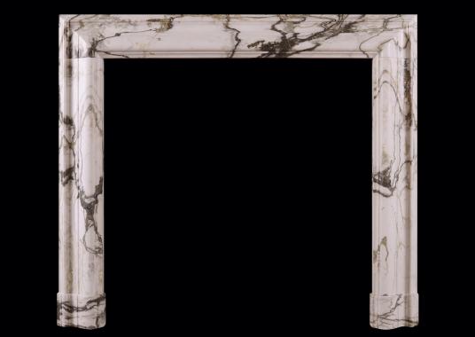 An English bolection in Calacatta Verde marble.