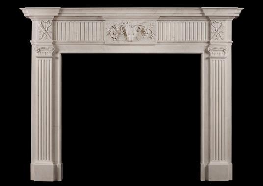 A Georgian Style White Marble Chimneypiece with Rams head to centre plaque