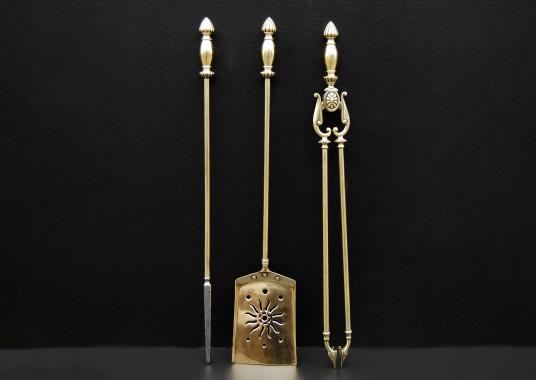 A set of late 19th century (circa 1880) brass English firetools