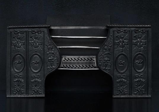 An early 19th century cast iron hob grate