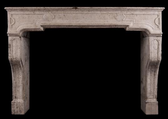 An architectural stone fireplace