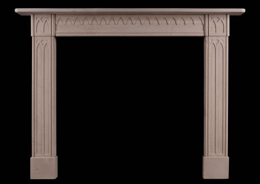 A late Georgian English limestone fireplace in the Gothic style