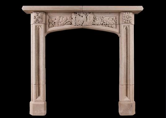 A well carved English, Gothic Revival Bath stone fireplace