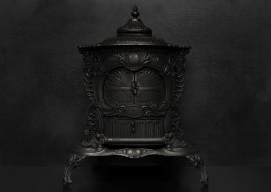 A decorative cast iron stove