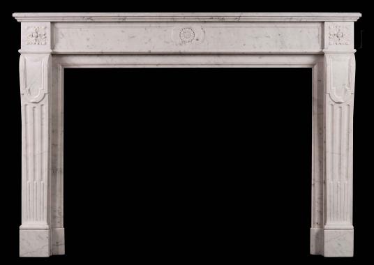 A 19th century French Carrara antique marble fireplace in the Louis XVI style