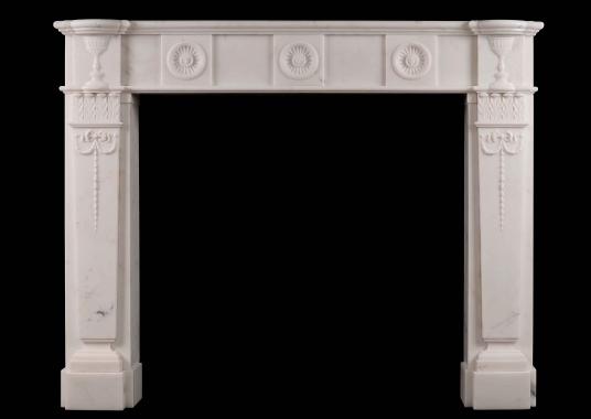 An English Regency style antique fireplace in Statuary marble