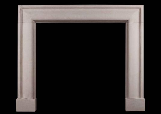 An English moulded bolection fireplace in Portland stone