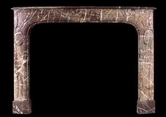 An 18th century French Louis XIV Ribboned Campan marble fireplace