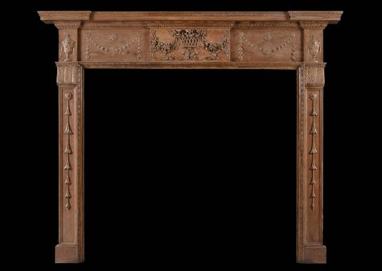 An English pine and gesso antique fireplace