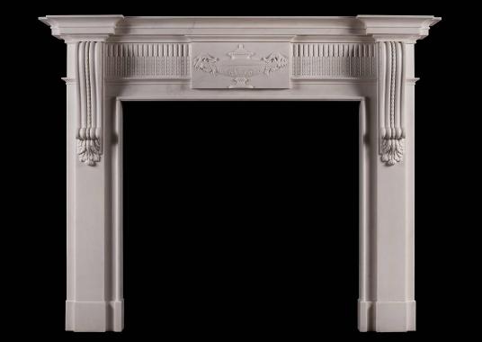 A Georgian style white marble fireplace with carved brackets