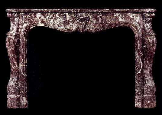 A French Louis XV style Rosso Levanto marble fireplace mantel