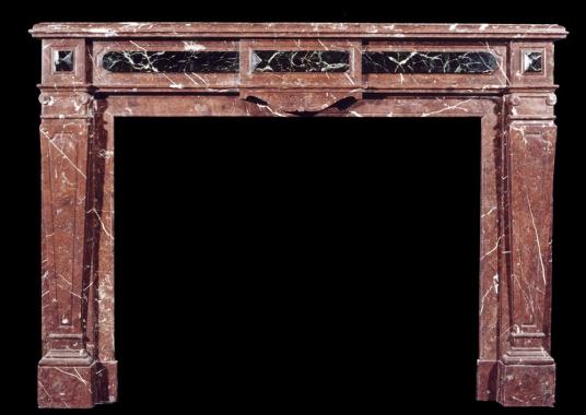 A French Louis XVI style Rouge Royale marble fireplace