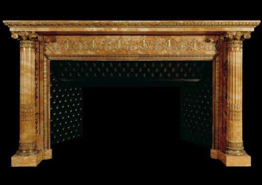 An important early French Napoleonic Empire Siena marble fireplace