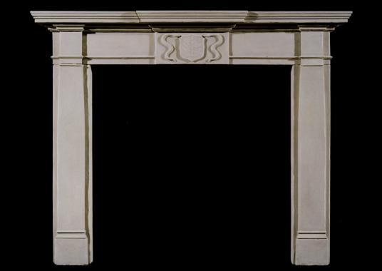 A 19th century English limestone fireplace