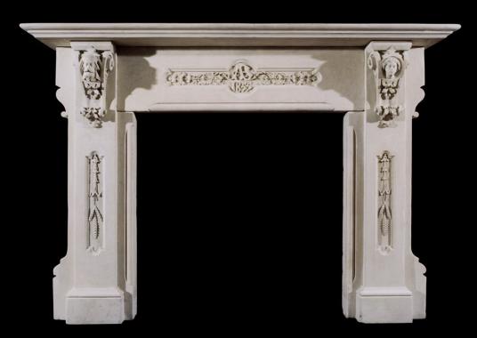 A 19th century English carved limestone fireplace in the Gothic taste