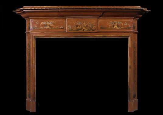 A 19th century English Japanned wood fireplace