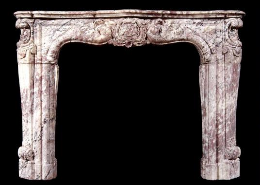 An 18th century French Louis XV Rose Boreal marble fireplace