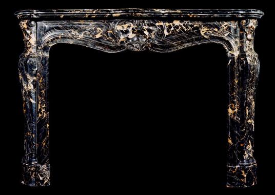 A 19th century French Louis XV style Portoro marble fireplace