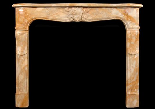 A 19th century Louis XV style Siena marble fireplace