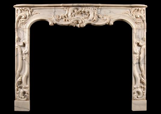 A French Provençale style Arabescato marble fireplace