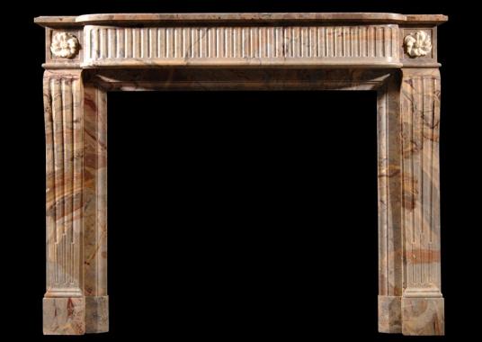 A French Louis XVI style Sarrancolin marble fireplace