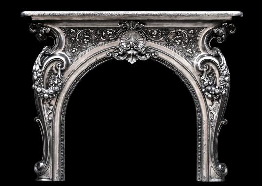 An ornate 19th century French cast iron fireplace