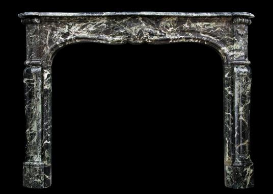 A French Louis XV style antique fireplace in Tinos green marble