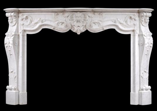 A fine quality French Louis XV style marble fireplace in Carrara marble