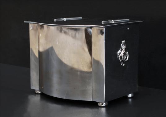 A polished steel coal bucket