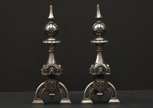 A pair of neo gothic steel firedogs