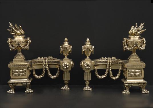 A very fine pair of decorative brass chenets