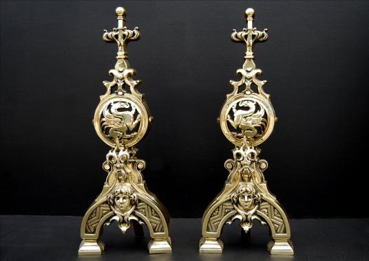 An impressive pair of French polished brass firedogs