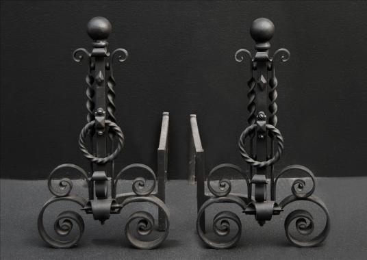A pair of scrolled wrought iron firedogs - 11 inch