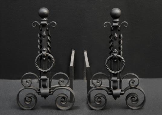 A pair of scrolled wrought iron firedogs - 11 inch