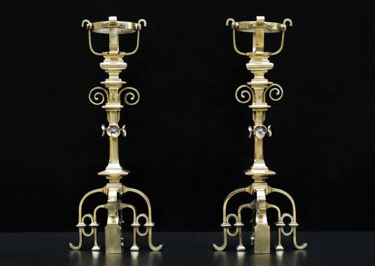 A pair of fine quality French Gothic Revival brass chenets