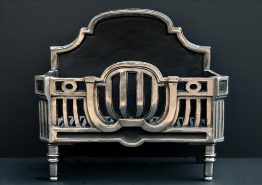 An Art Deco style polished steel firebasket