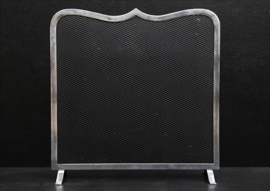 A steel firescreen with shaped top