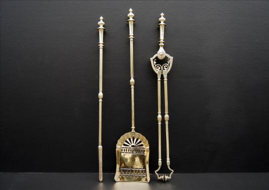 A set of unusually large English brass firetools