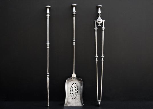 An elegant set of 19th century English steel firetools