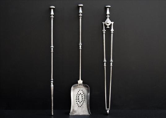 An elegant set of 19th century English steel firetools